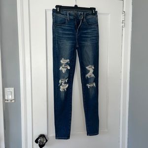 AMERICAN EAGLE ripped low rise straight leg skinny